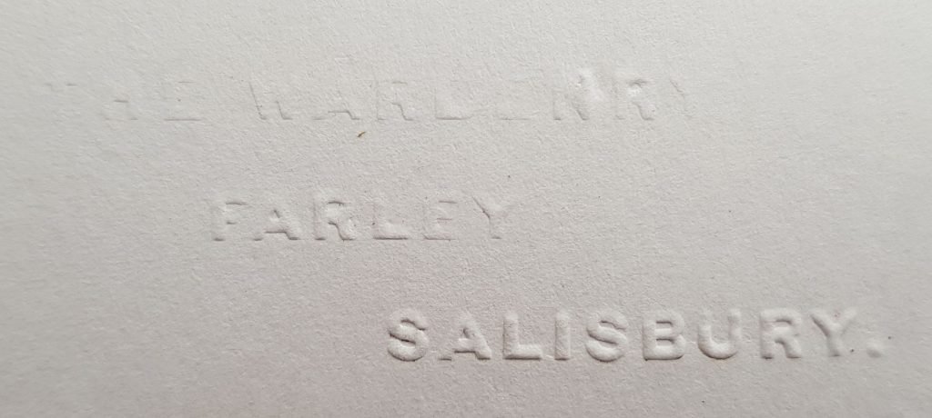 paper that has been stamped, some text not readable as the stamp is old, but which says "The Wardenry, Farley, Salisbury"